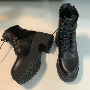 Rock & Candy lace up platform heeled combat boots